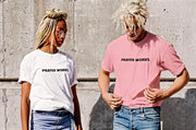 "Prayer Works." Desert Pink t-shirt with black print; unisex